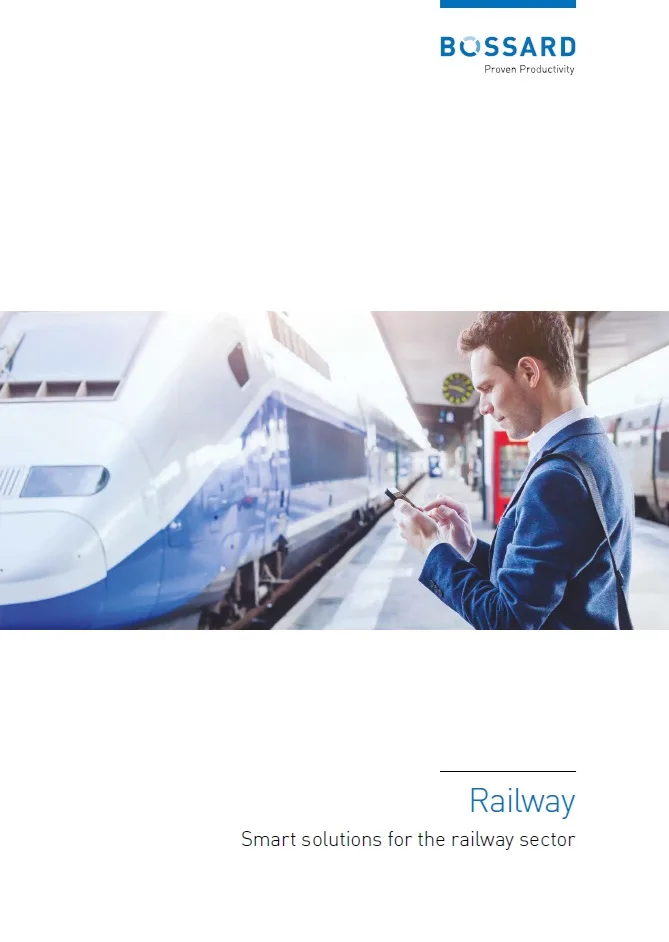 Man using phone while waiting for the arrival of train