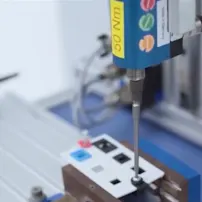 Closeup of MM-Welding ultrasonic welding equipment operating