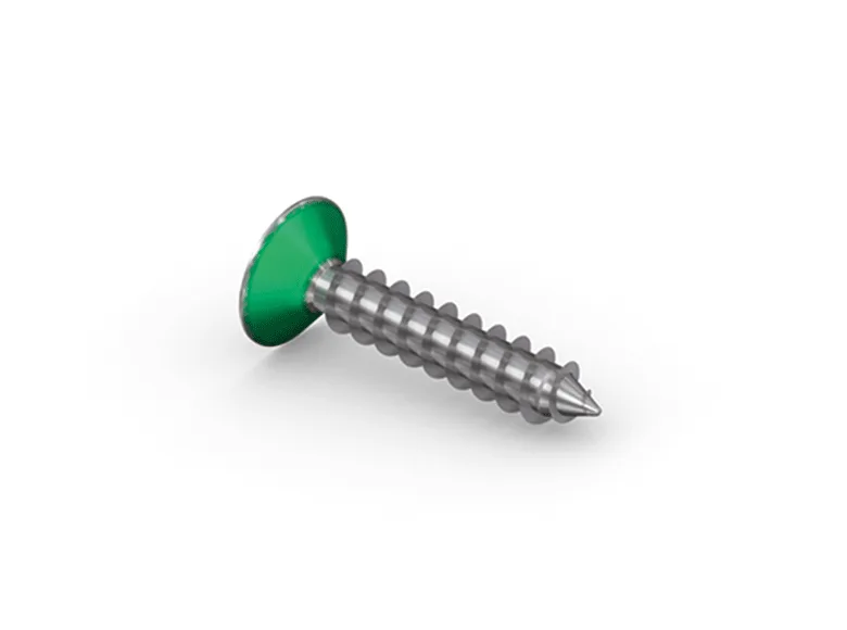 A screw with green Nyseal underhead coating on white background