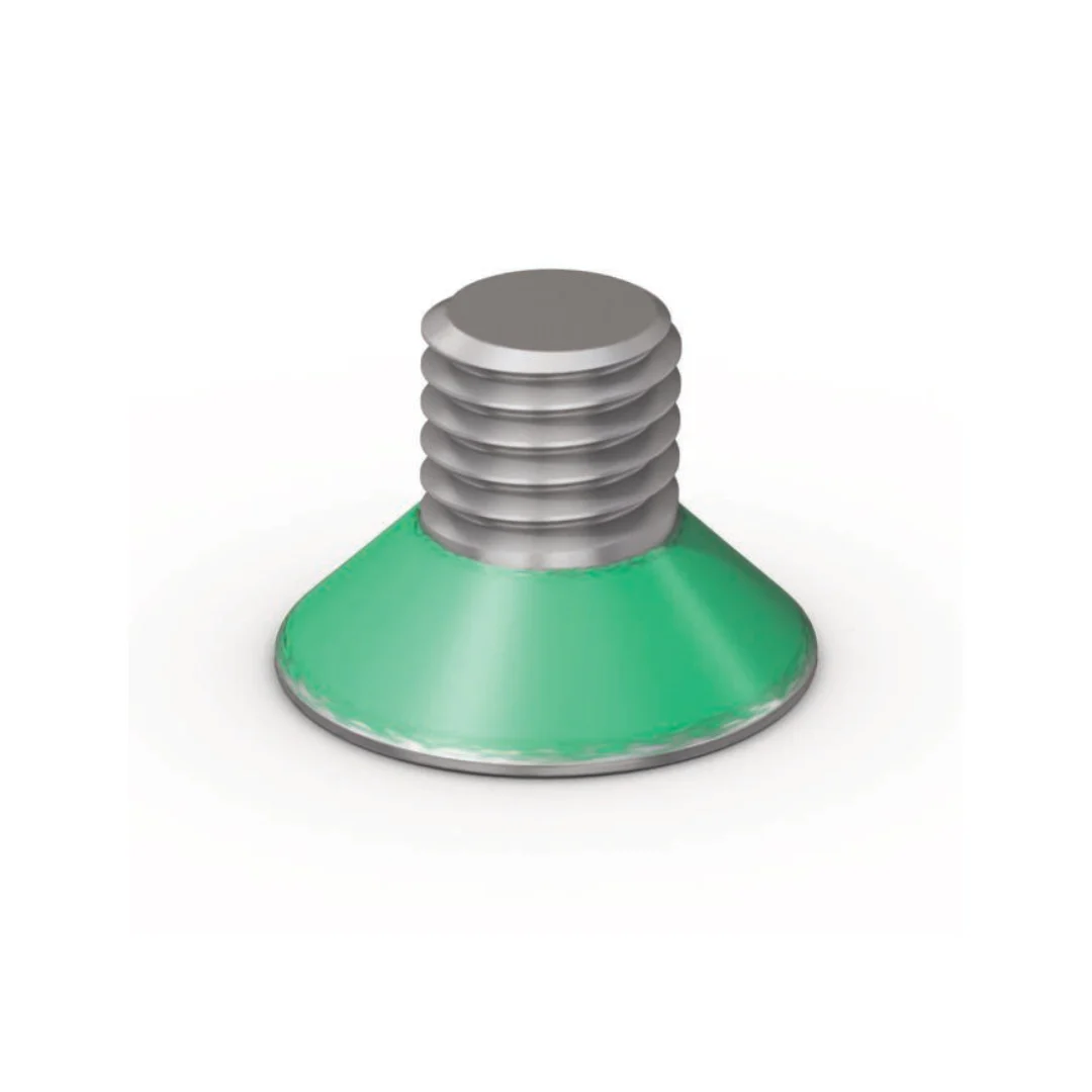 A short, countersunk screw with metric thread and green Nyseal under-head coating standing on its head on white background