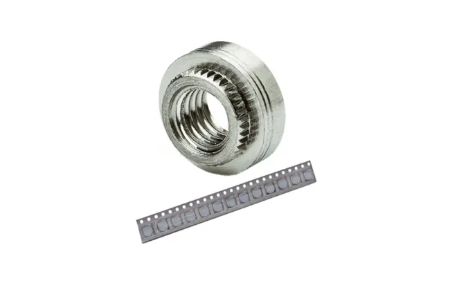 A PEM self-clinching nut and a taped PEM SMT nut strip, designed especially for PC board mounting