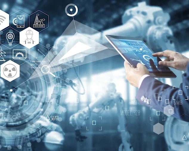 Une image abstraite d'une tablette utilisée par une personne, destinée à montrer que les nouvelles technologies peuvent améliorer les processus de production et l'efficacité.