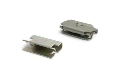 A set of metal trim clips on white background