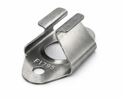 Metal part with chemical treatment on white background