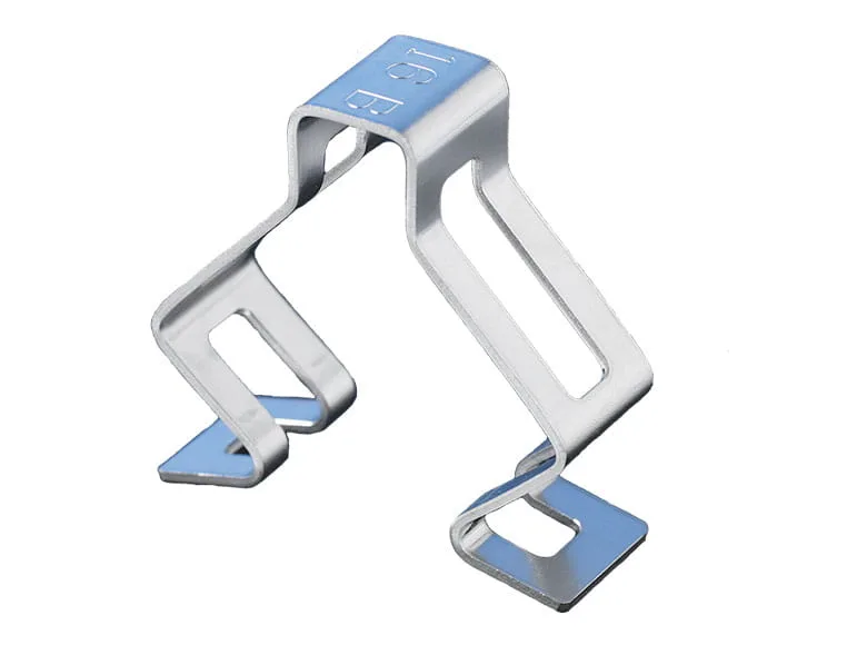 Example of a metal punched and bent part (a clamp) on white background