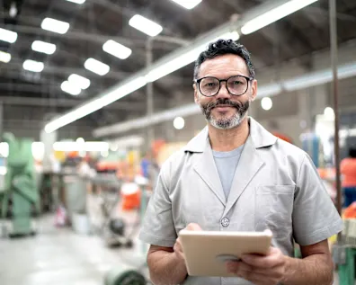 Male production supervisor in production hall
