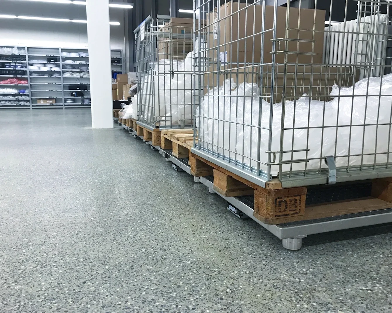 Pallets on scales in warehouse