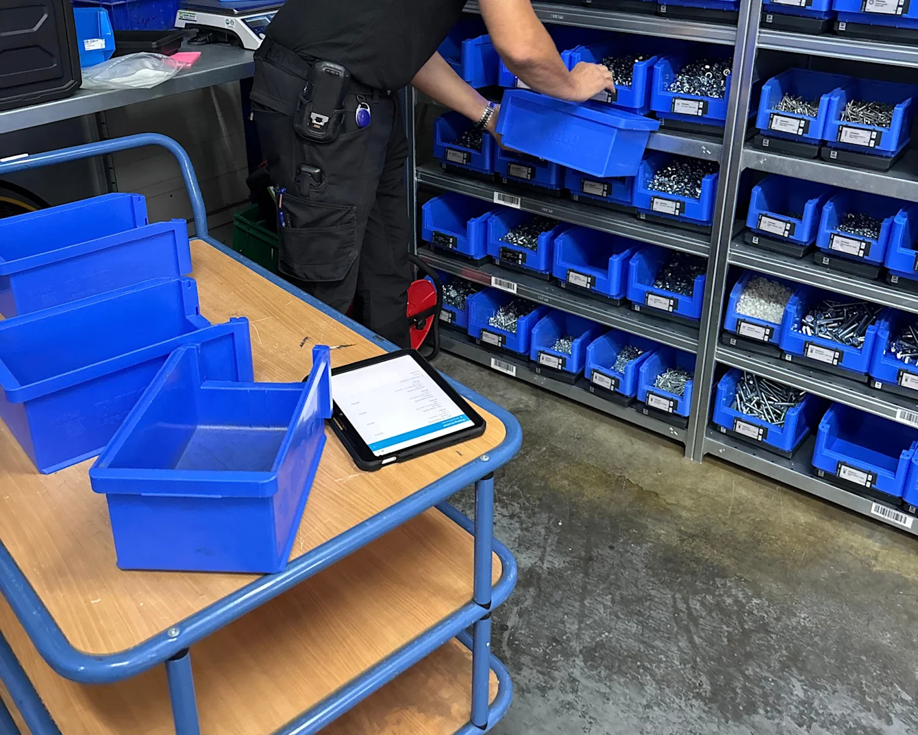 Tablet on a trolley in front of SmartBins at GRAPER