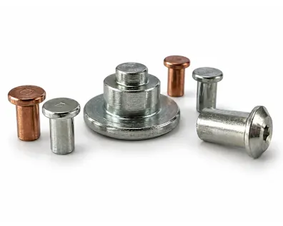 Various Tucker T-Studs in different sizes and surface coatings on white background.