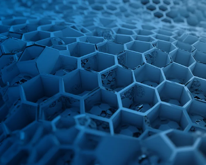 Blaue Nahaufnahme einer wabenförmigen Struktur, symbolisiert innovative Verbindungstechnik für Kunststoffe.