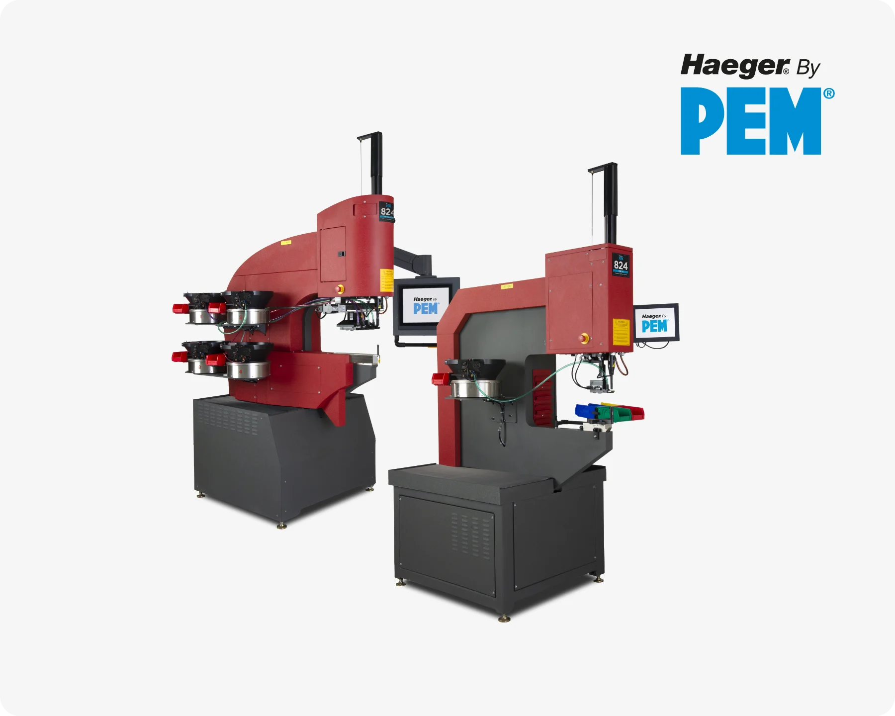 兩台Haeger壓入機用於淺灰色背景上的自扣緊緊固件。