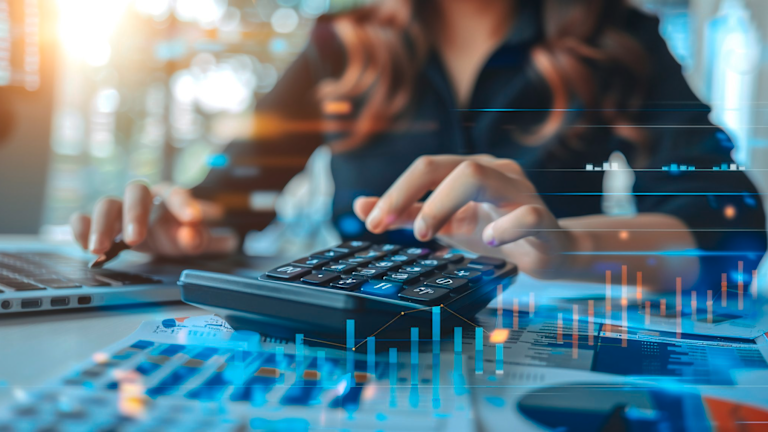 woman using calculator