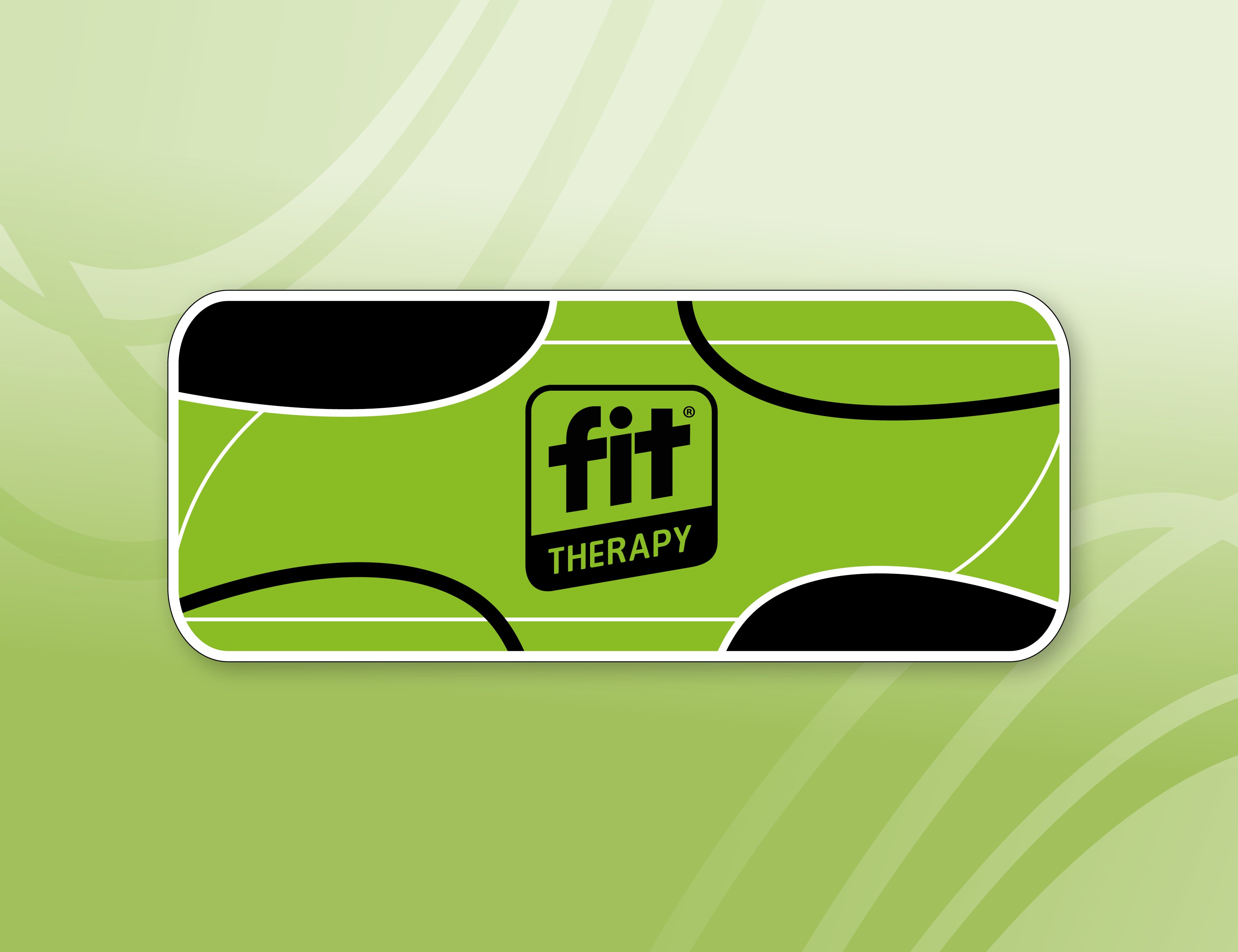 Rektangulært grønt FIT Therapy-plaster med sorte og hvide grafiske linjer og logo i midten på en lysegrøn baggrund.
