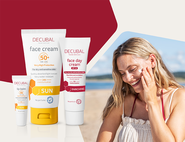 Her ses Decubal ansigtsplejeprodukter sammen med en kvinde, der smører creme på kinden ved stranden.
