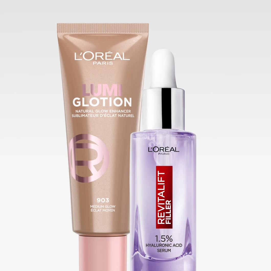 Bilde som viser to L'Oréal produkter: en brun tube med L'Oréal Lumi Glotion og en lilla flaske med L'Oréal Revitalift Filler 1.5% Hyaluronic Acid Serum. Bakgrunnen er hvit.