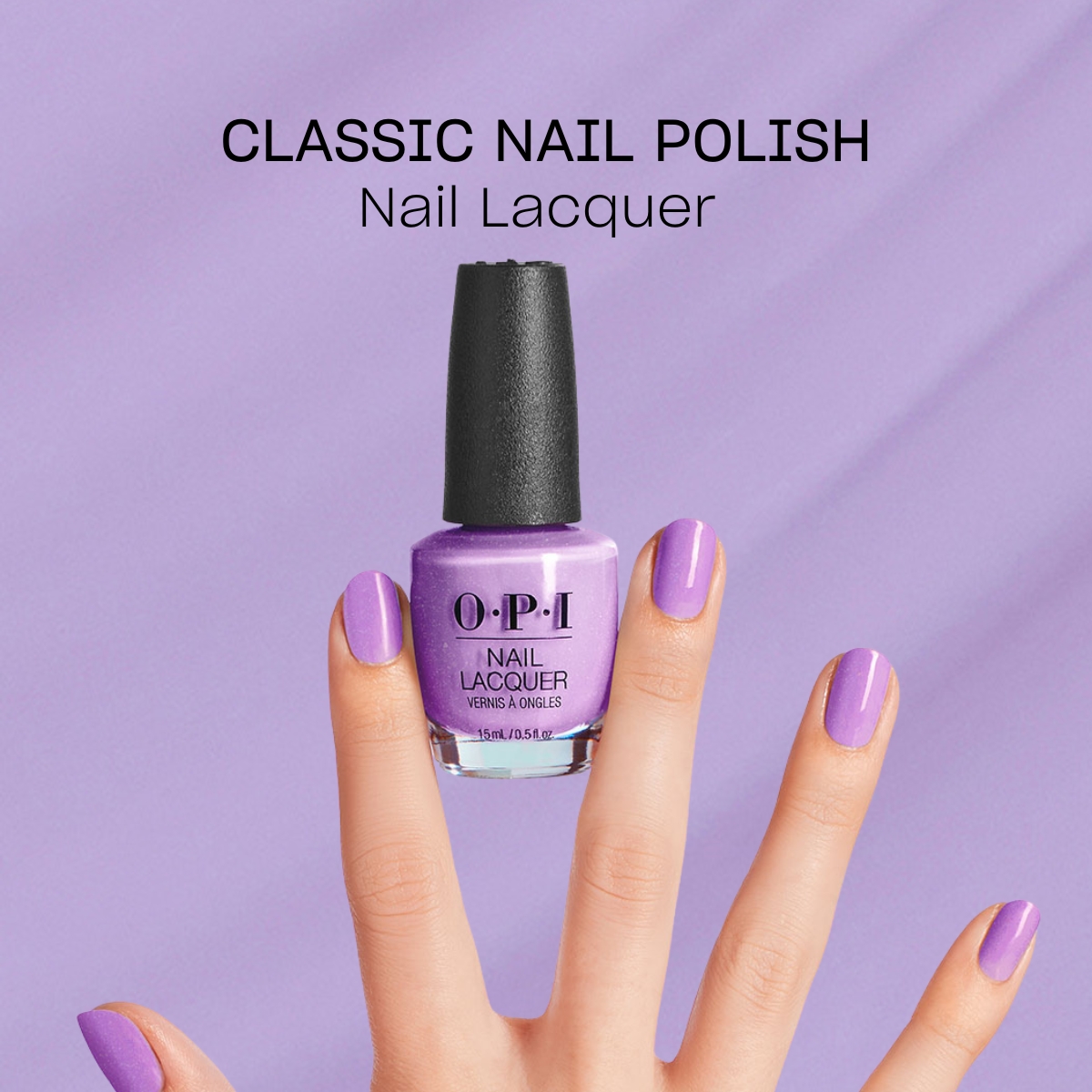 En hand med lila nagellack från märket OPI. Bakgrunden är lila och texten "Classic Nail Polish Nail Lacquer" står ovanför nagellacksflaskan.