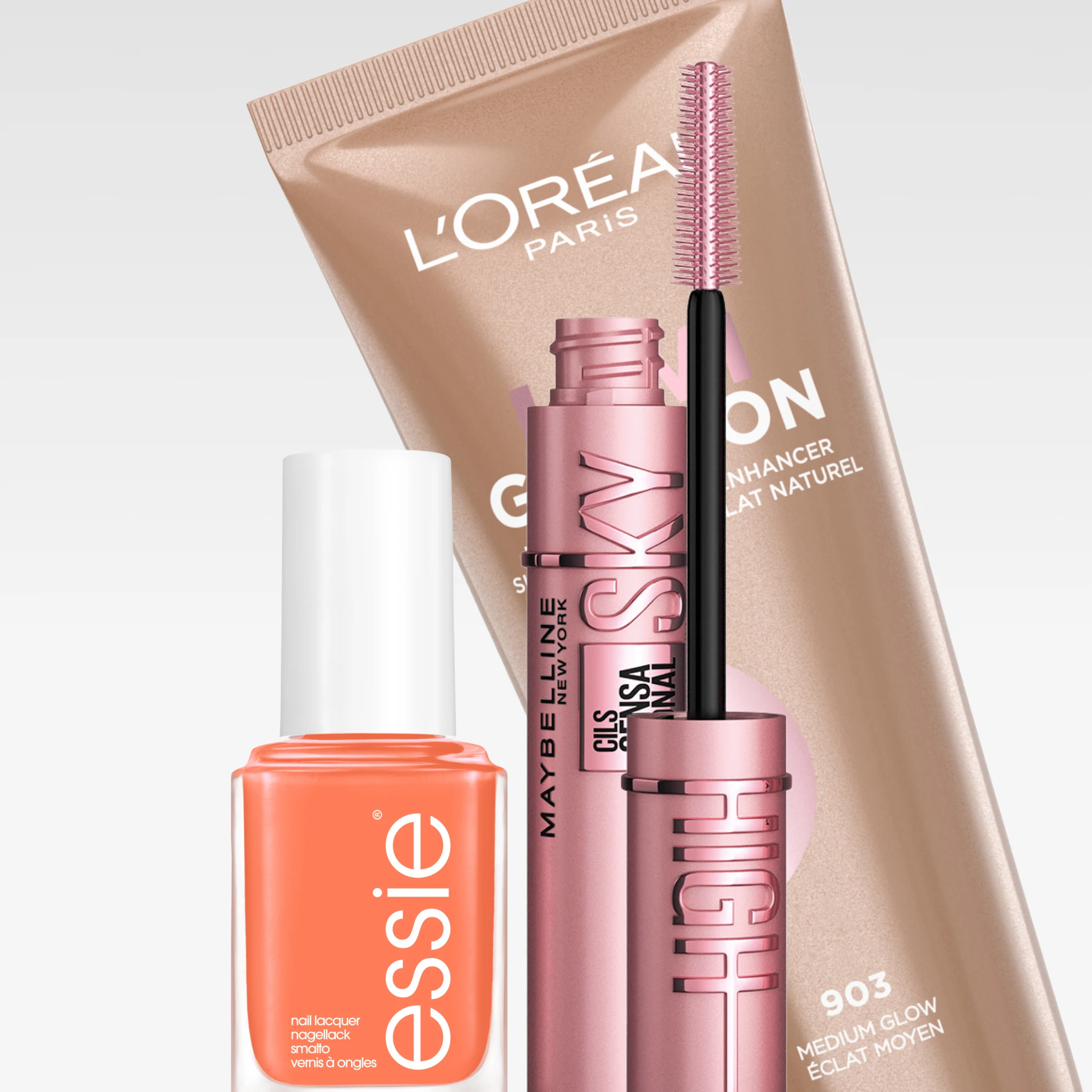Makeupprodukter mot ljus bakgrund från essie, L’Oréal Paris och Maybelline New York. Bilden visar essie nagellack, Prodigieux Le Teint Éclat Tinted Moisturizing BB Cream 24H, Lumi Glotion Natural Glow Enhancer och Lash Sensational Sky High mascara.