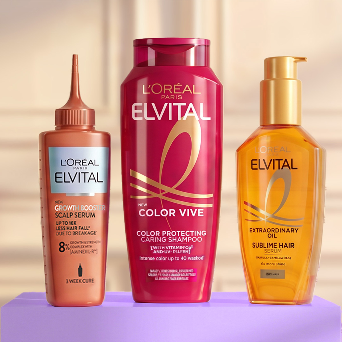 L’Oréal Paris Elvital -hiustenhoitotuotteita vaalealla taustalla.