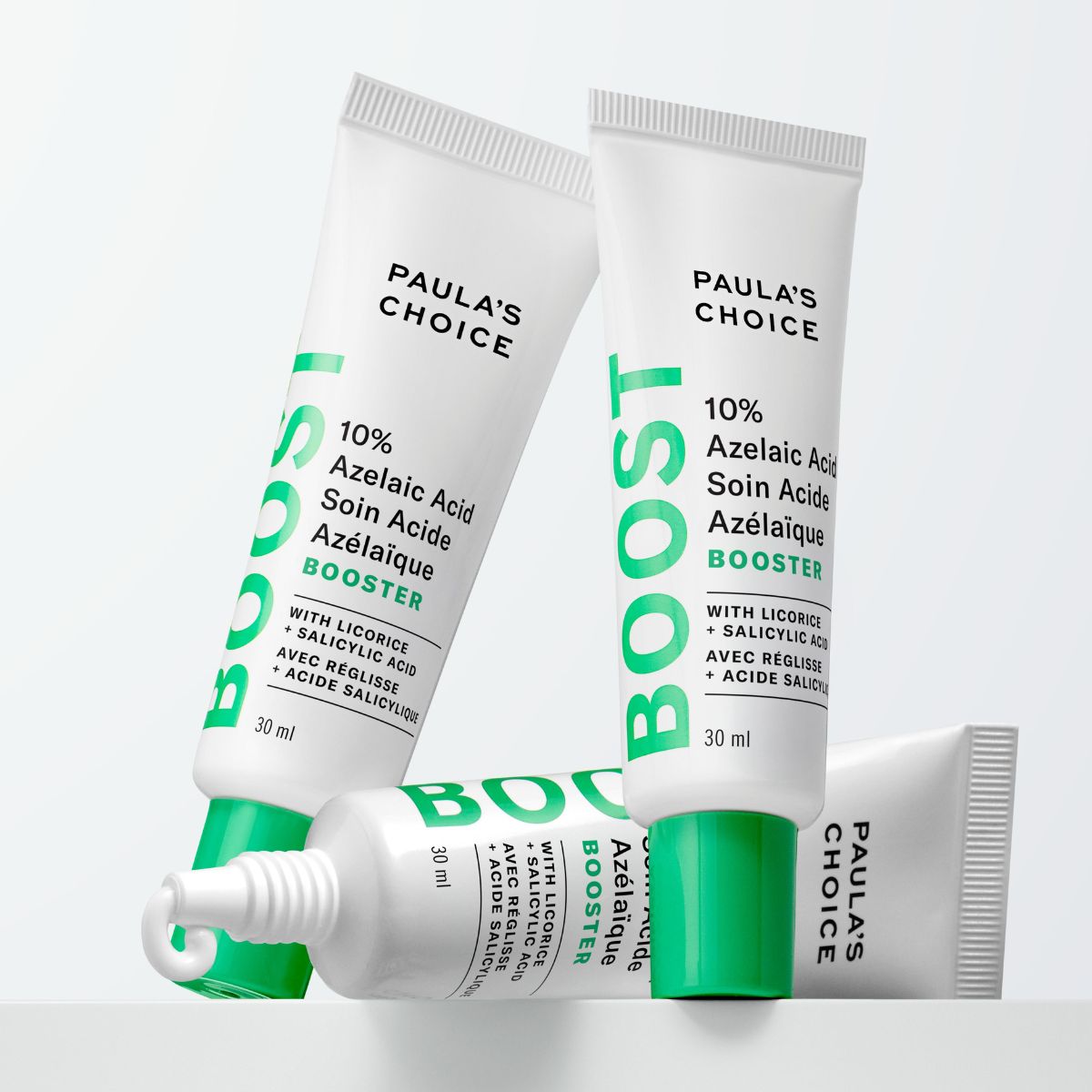 Paula's Choice - Tre vita tuber med gröna detaljer som innehåller 10% azelainsyra.
