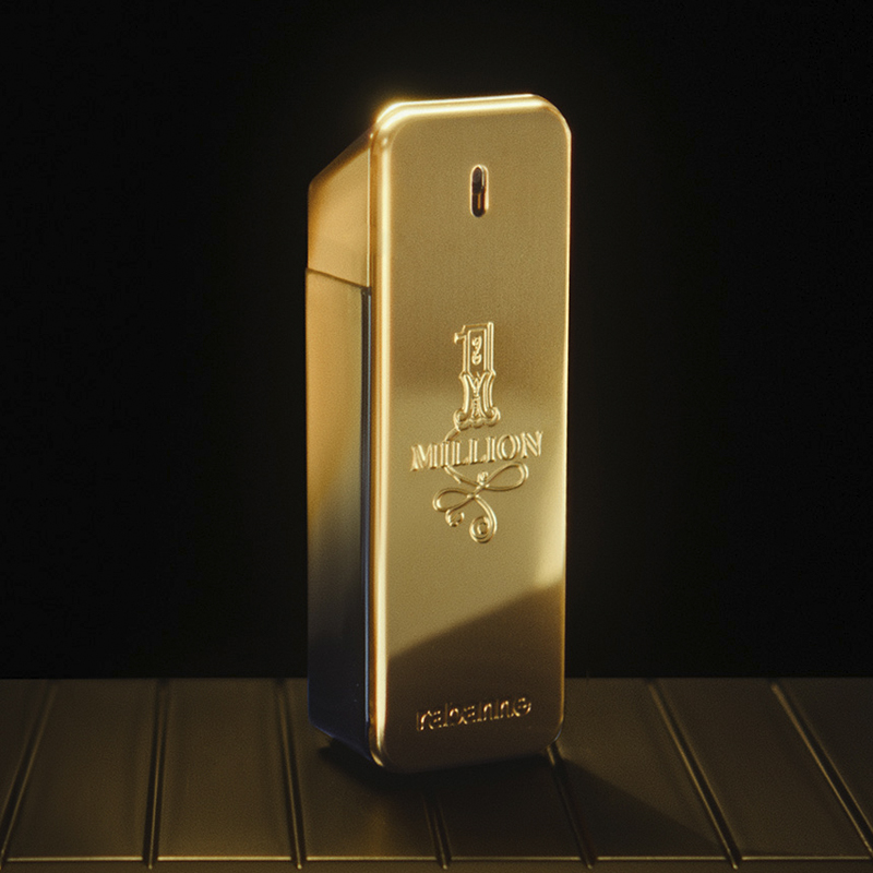 Parfymen Million Gold framför en svart bakgrund.