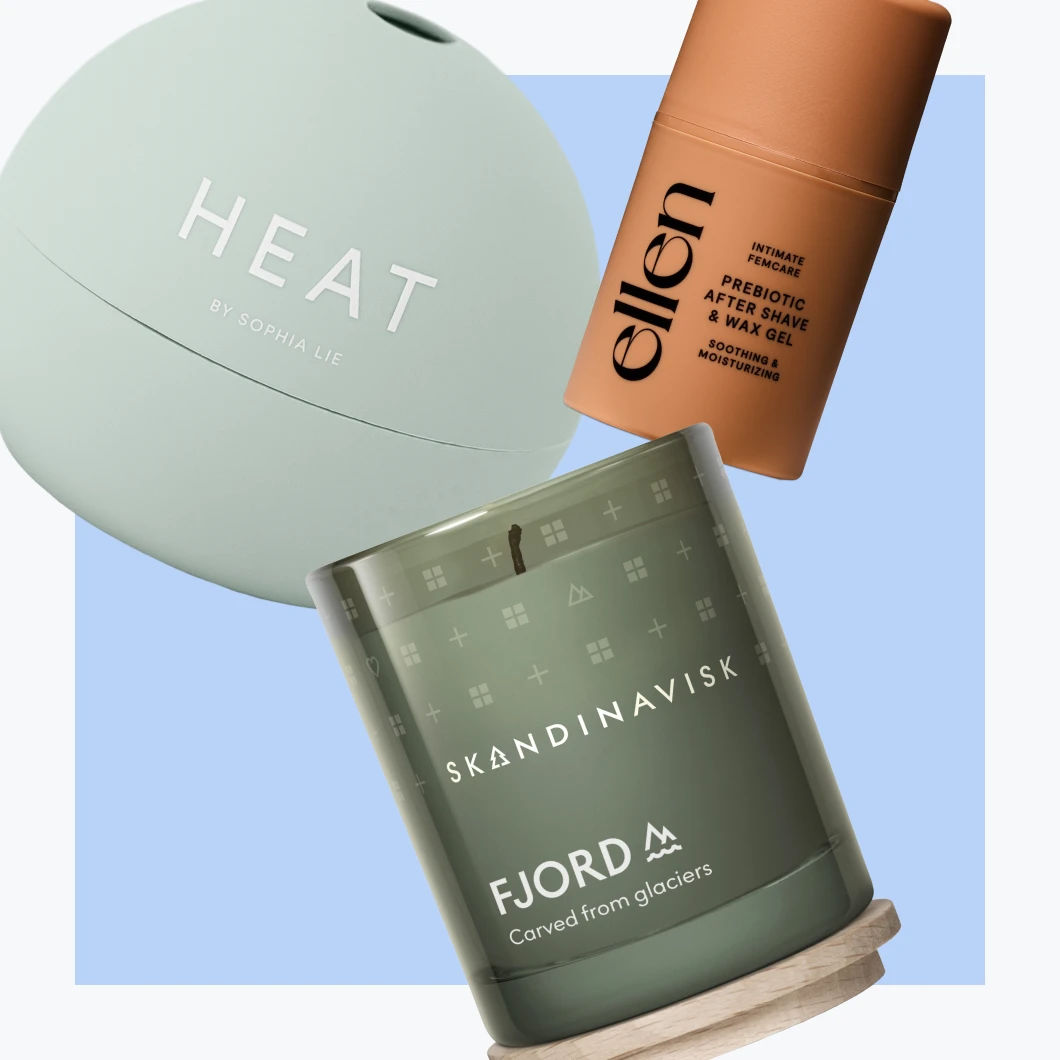 HEAT by Sophia Lie, ellen Prebiotic After Shave & Wax Gel med texten ”Intimate Femcare”, ”Soothing & Moisturizing” samt det gröna doftljuset SKANDINAVISK FJORD med texten ”Carved from glaciers”.