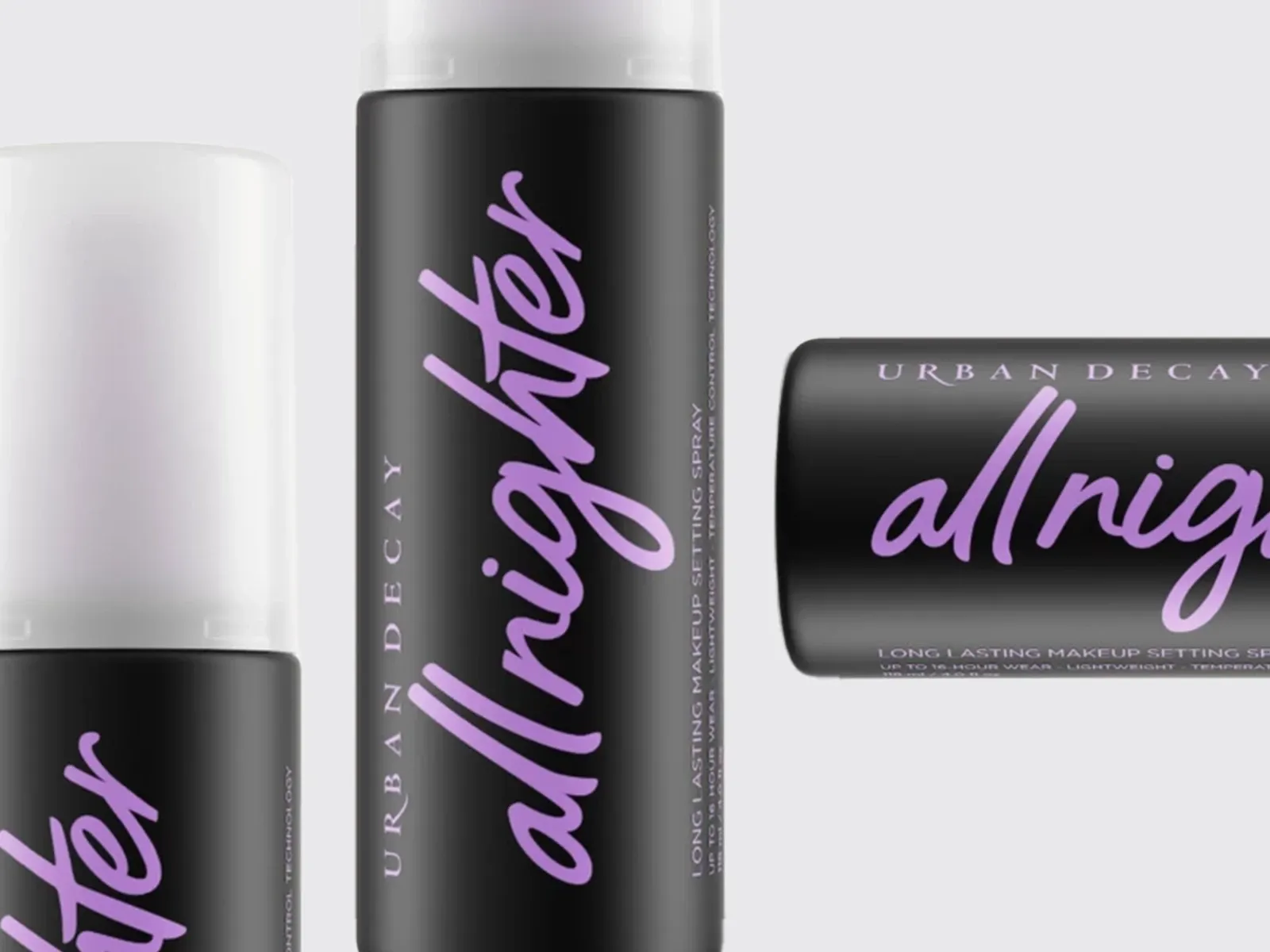 Tre All Nighter fra Urban Decay plassert ved siden av hverandre mot en grå bakgrunn.