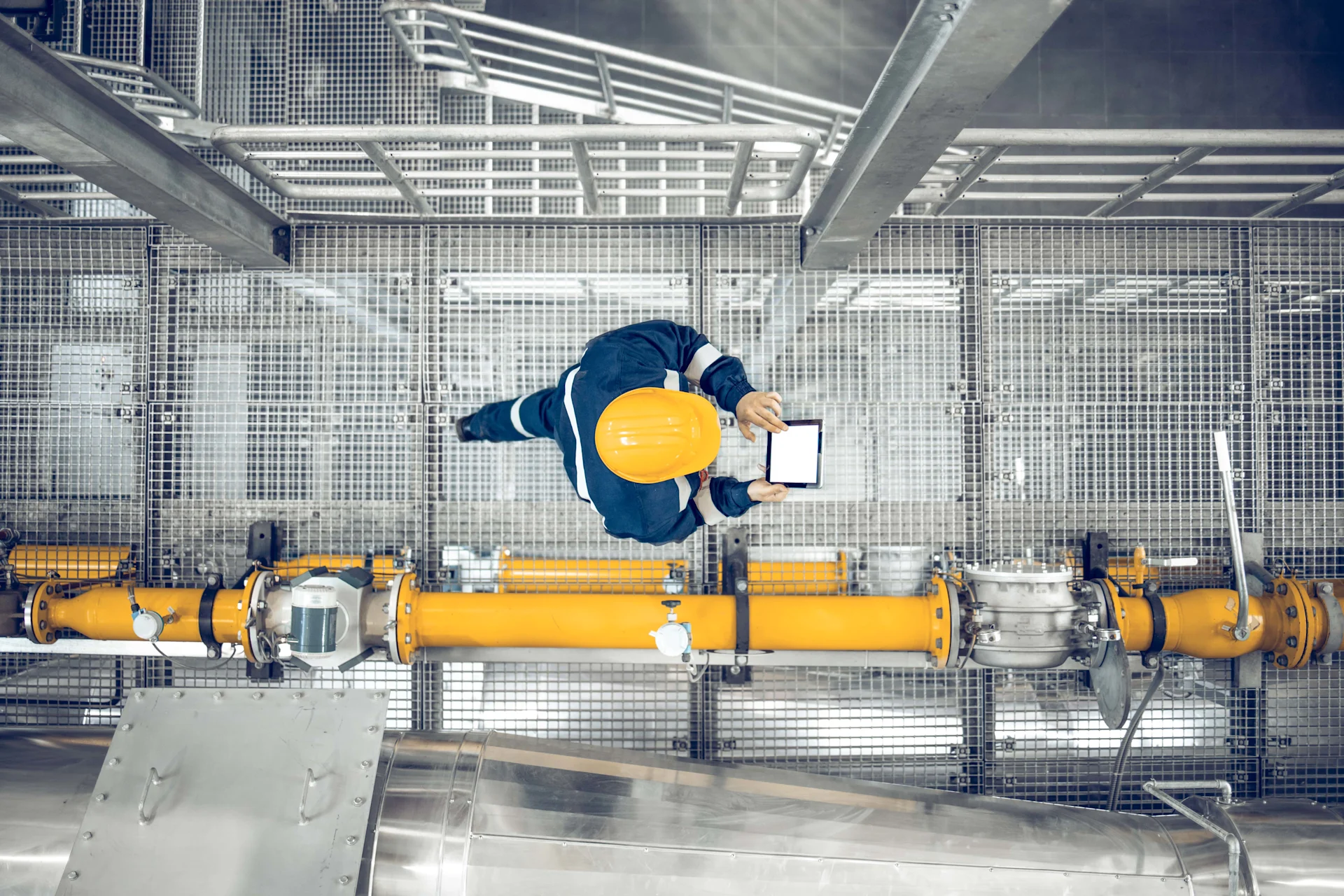 Top view of refinery worker -min
