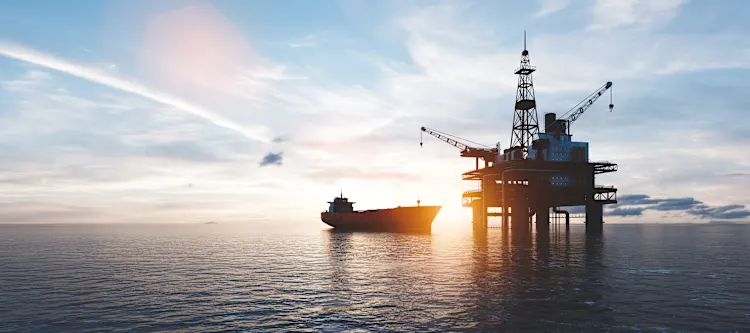 Oil platform on the ocean. Offshore drilling for gas and petroleum or crude oil. Industrial