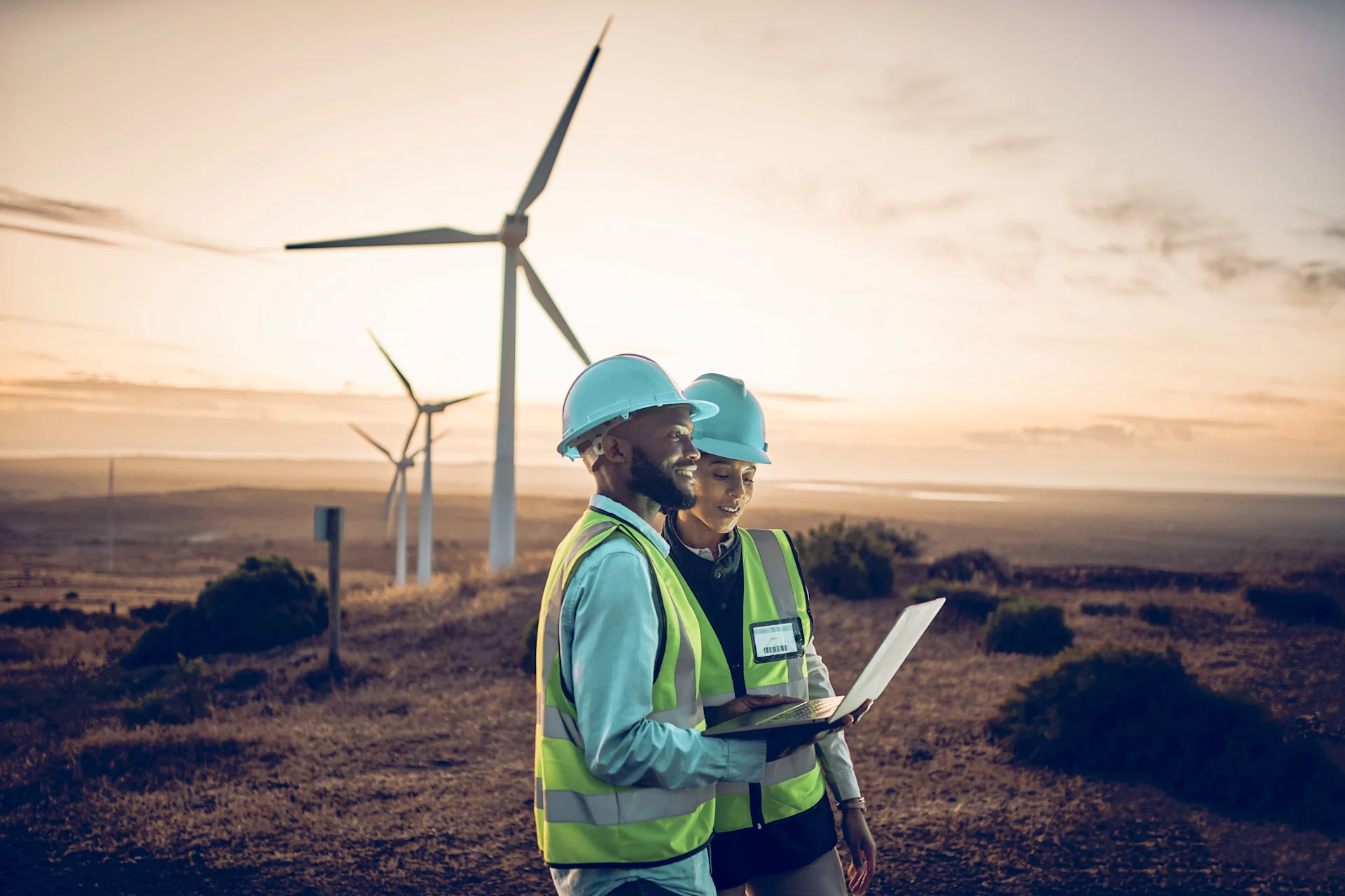 Laptop, farm and engineer team together at night for renewable energy-min