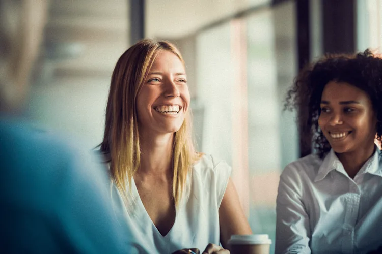 woman-at-work-smiling-min