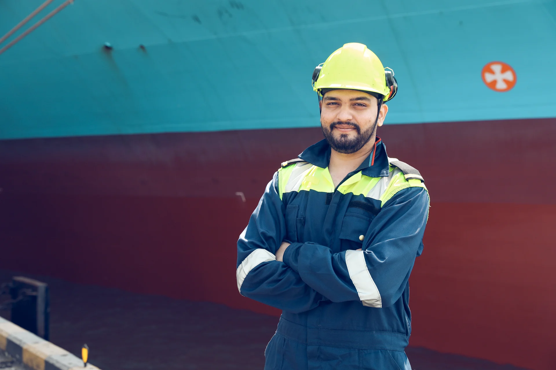 Man in front of vessel