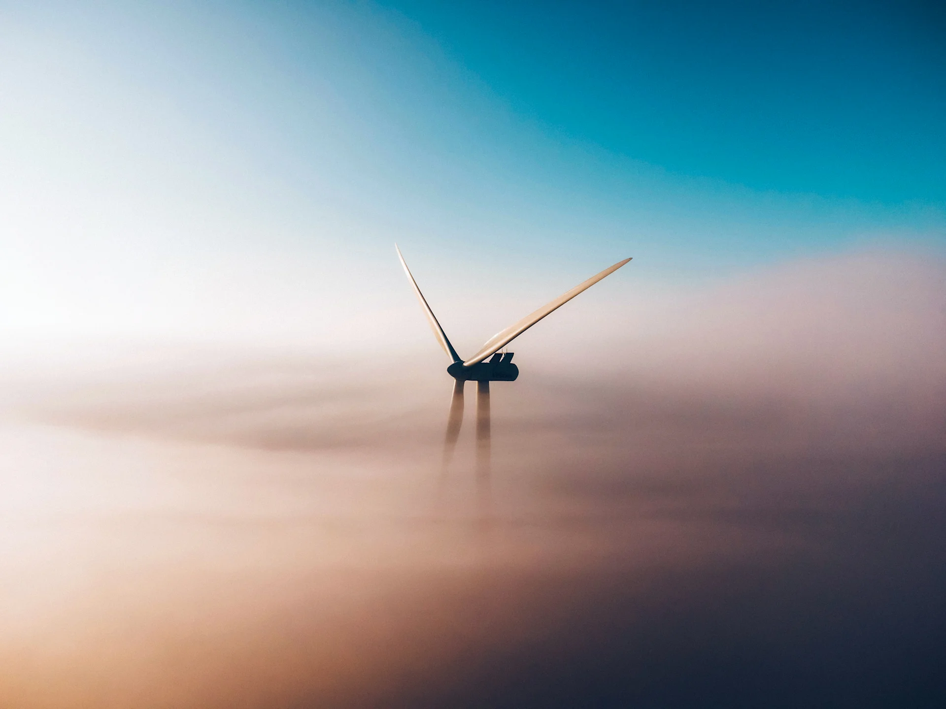 Wind Turbine through the clouds