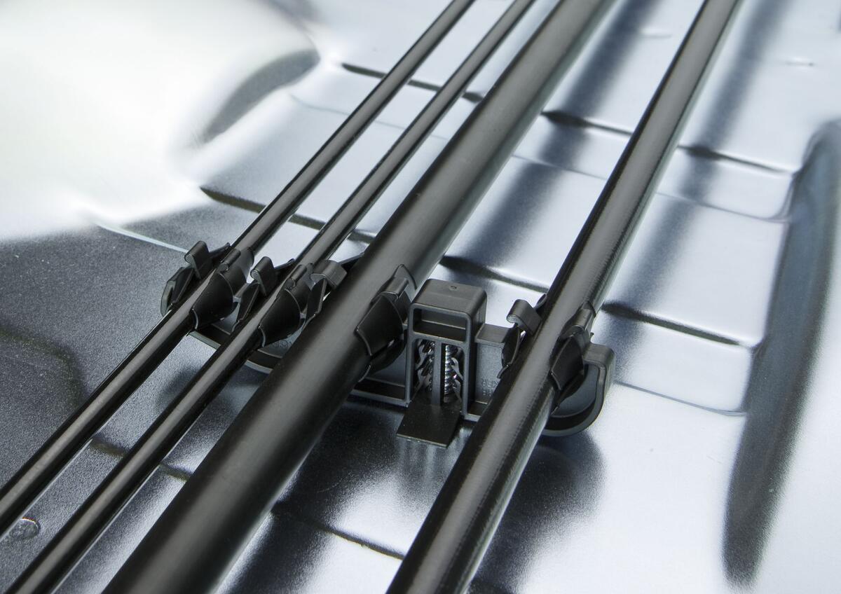 Welding stud with cable clip attachment