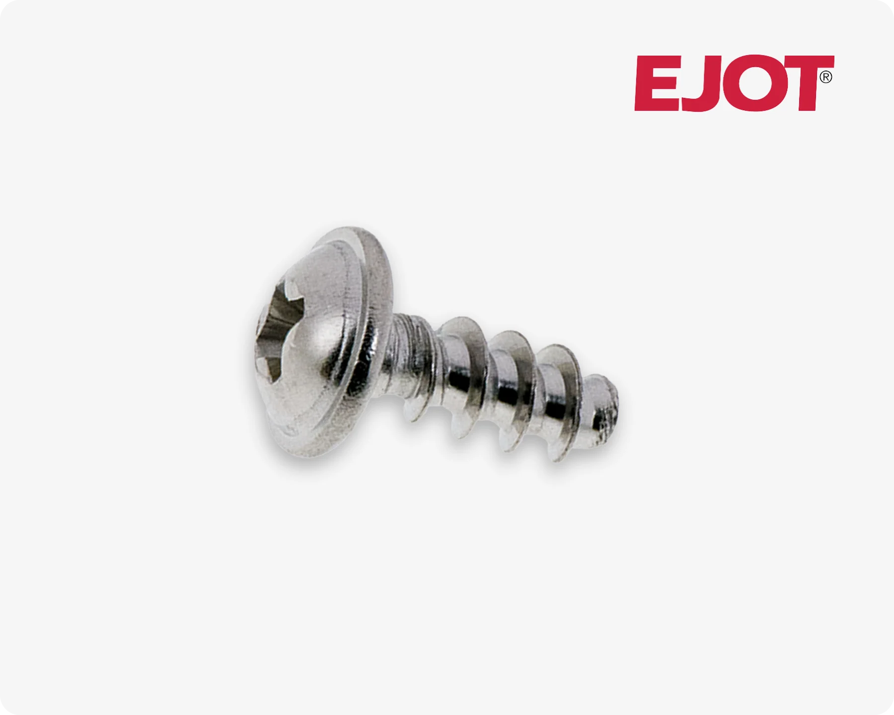 Close-up of an EJOT PT self-tapping screw for thermoplastic applications on light grey background.