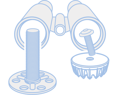 Two special fastening elements, a bigHead and a MM-Welding fastener, in front of a binocular.