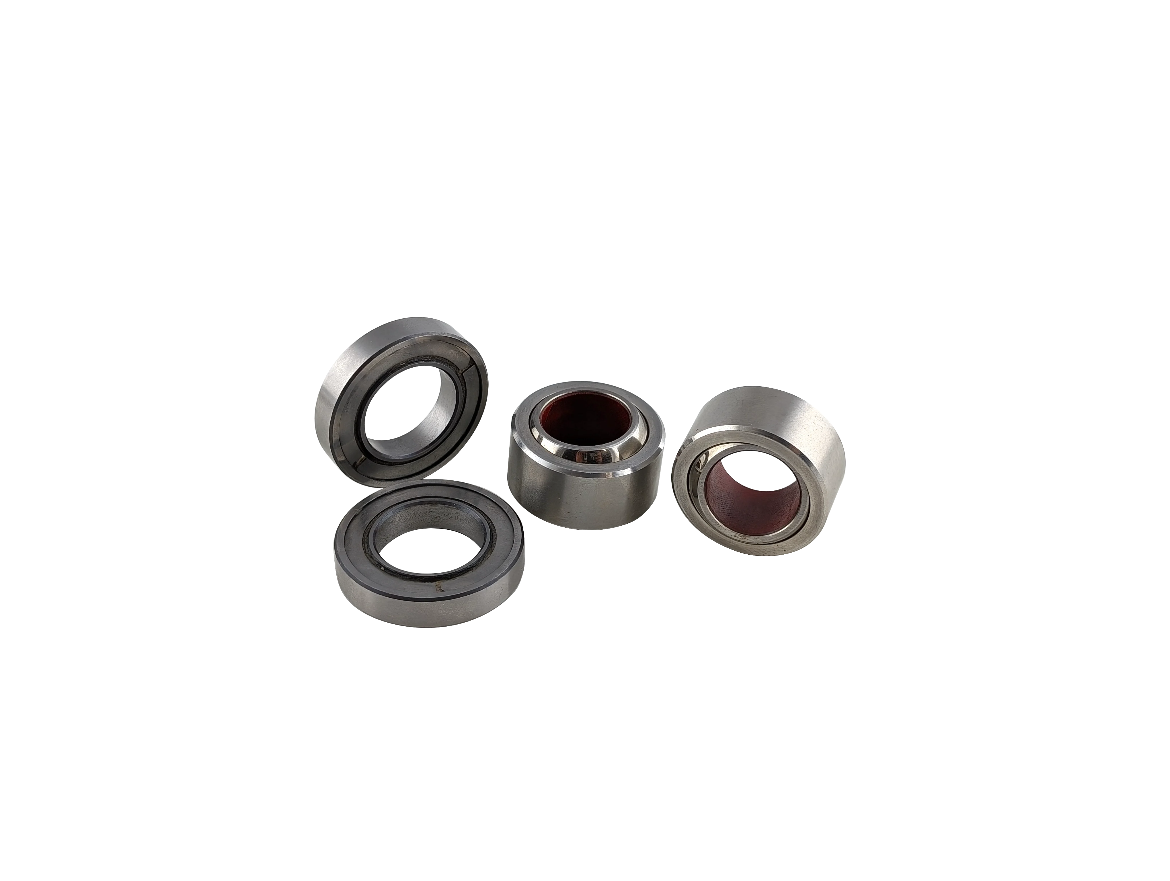A collection of aerospace bearings on a transparent background, emphasizing their industrial design.