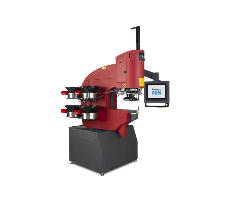 La pressa di inserimento Haeger 824 OneTouch5e con cambio utensile a 4 posizioni e sistema di alimentazione automatica a 4 vie per inserti