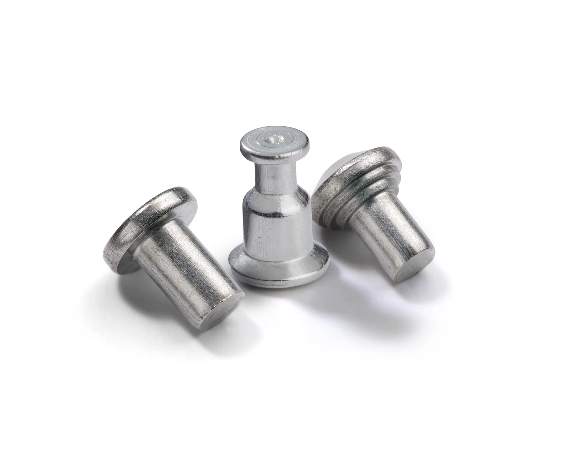 Close up of three Stanley Tucker unthreaded weld studs