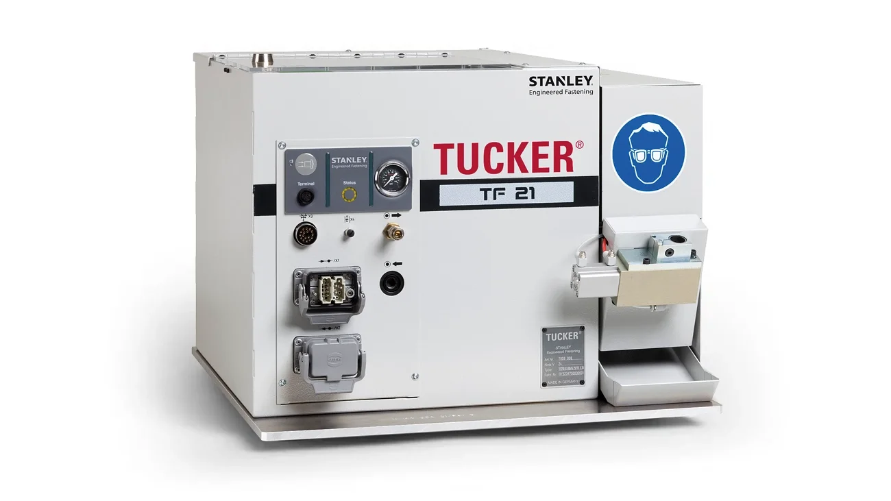 Tucker stud welding feeding unit for feeding welding studs to the stud welding system.