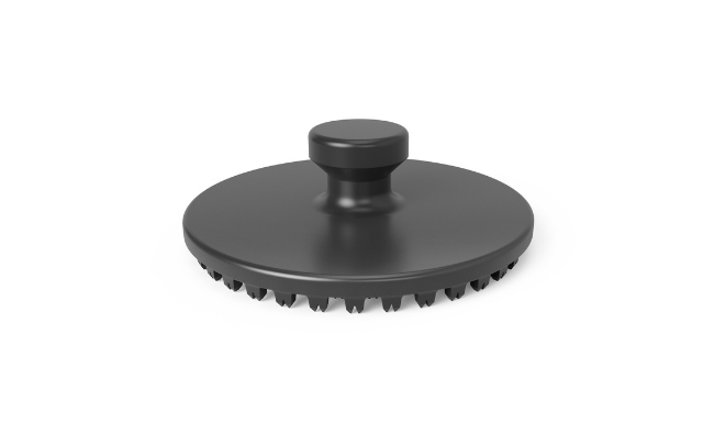 Ein schwarzer MM-Welding LiteWWeight® Lotus Abalone Befestiger zur Installation des Clip-Komponents von Bodenmattenbefestigungen in Autos.