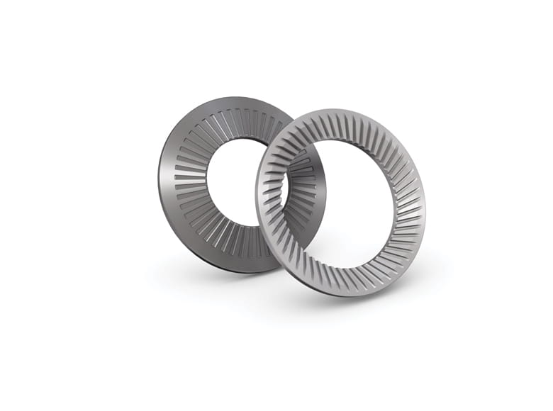 Two metal ribbed lock washers on white background