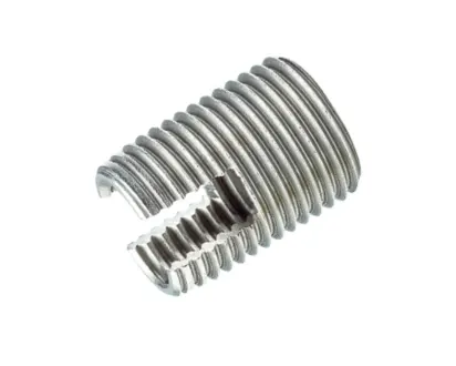 Silver FASTEKS metal threaded insert with self-tapping slot profile on a white background.