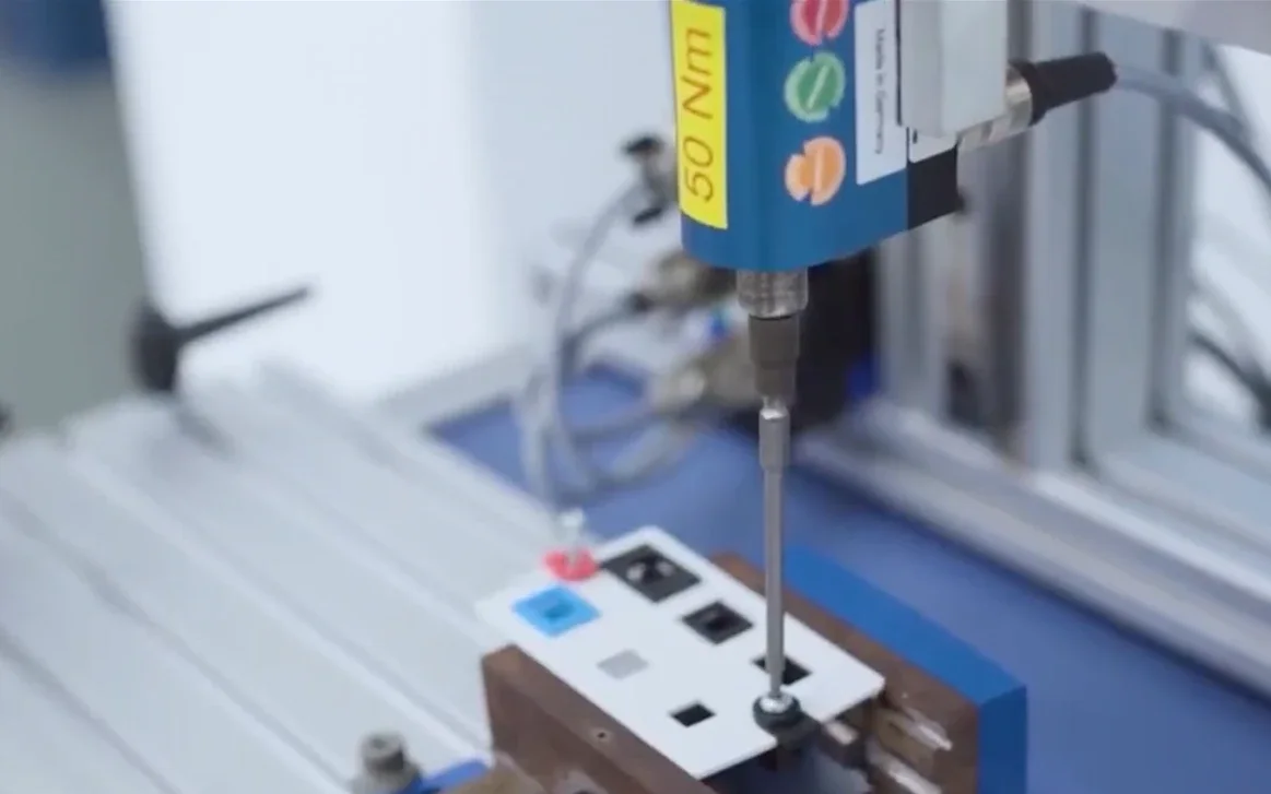 Closeup of MM-Welding ultrasonic welding equipment operating