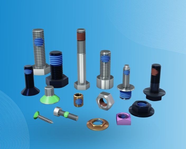 Sortiment an TufLok® Schrauben und Muttern mit farbigen Vorbeschichtungen auf blauem Hintergrund.