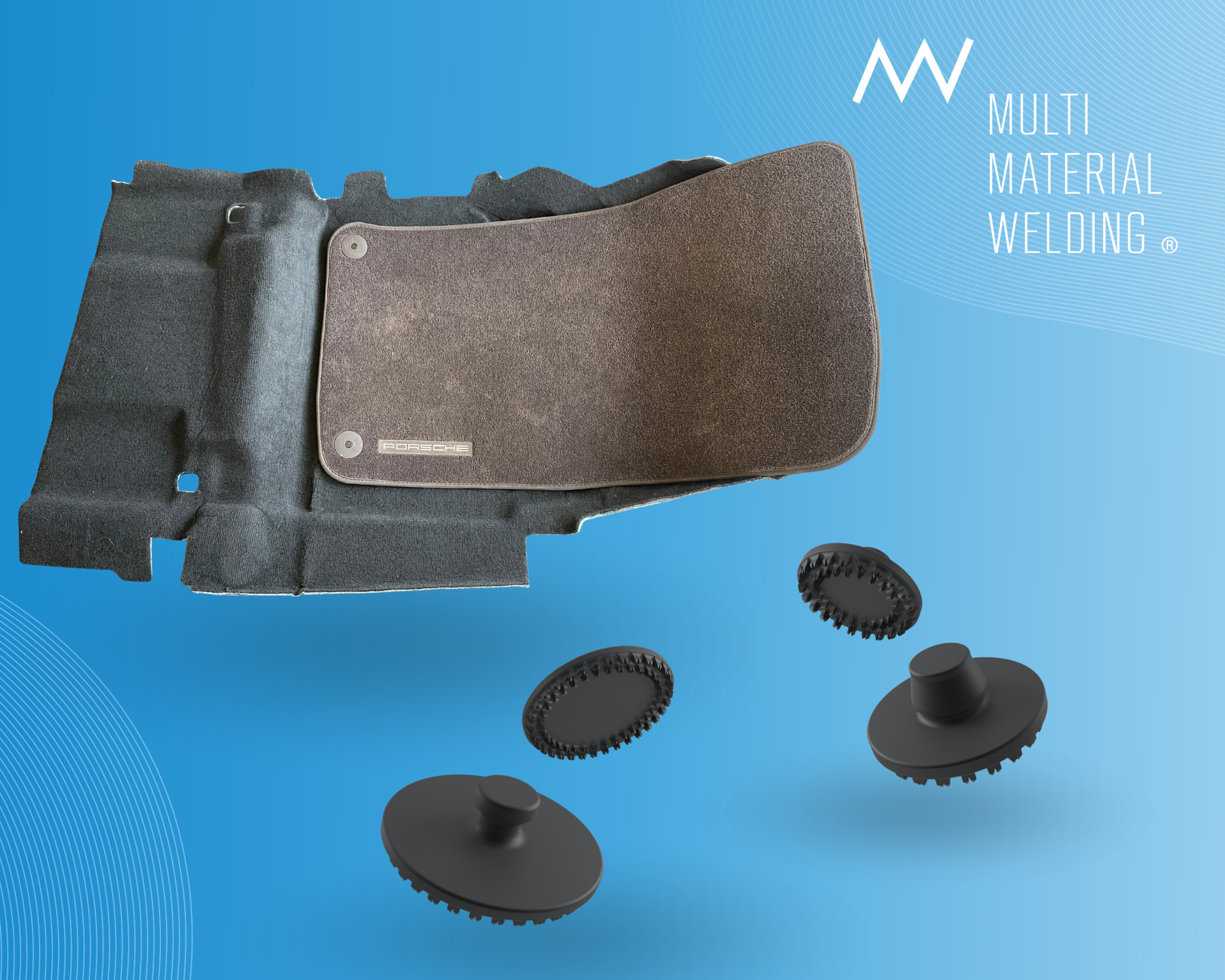 Fahrzeugteppich mit befestigter brauner Fußmatte und vier schwarzen LiteWWeight® Lotus Abalone Clip-Komponenten auf blauem Hintergrund.