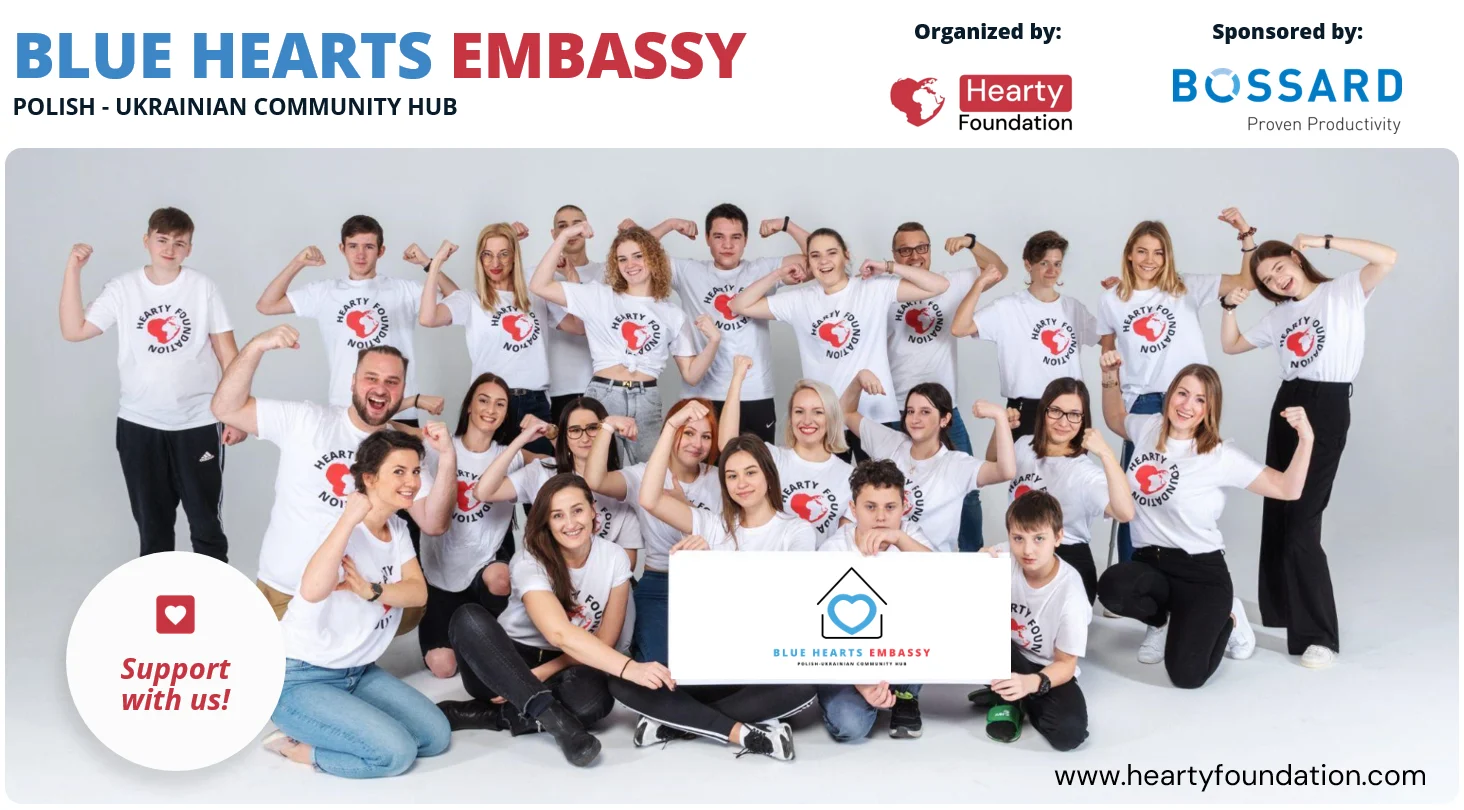 People in white t-shirts bearing the Heart Foundation logo, showcasing the the Polish-Ukrainian community HUB.