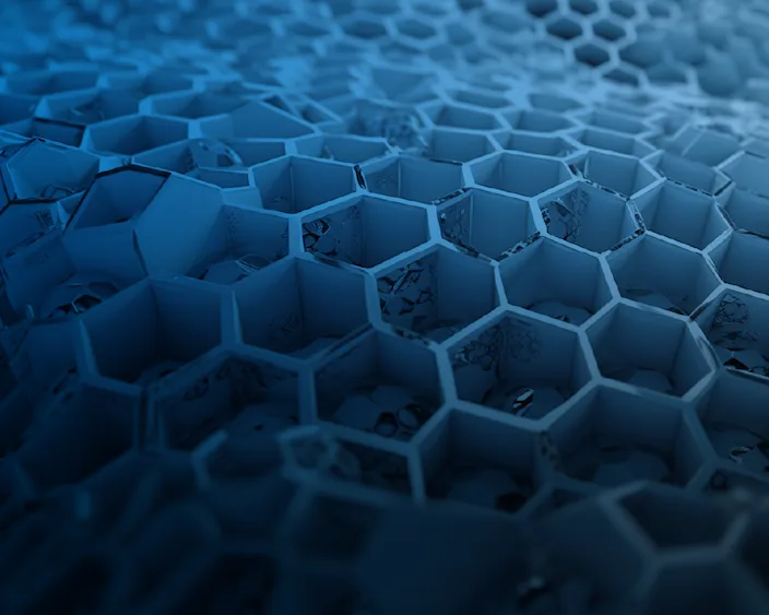 Nahaufnahme einer blauen, wabenförmigen Struktur, symbolisiert innovative Verbindungstechnik für Kunststoffe.