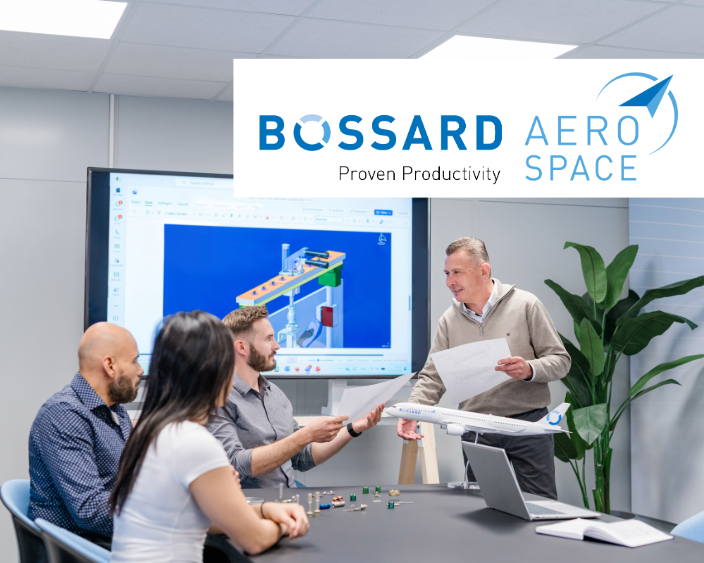 Two people discussing about aerospace related drawing on the screen