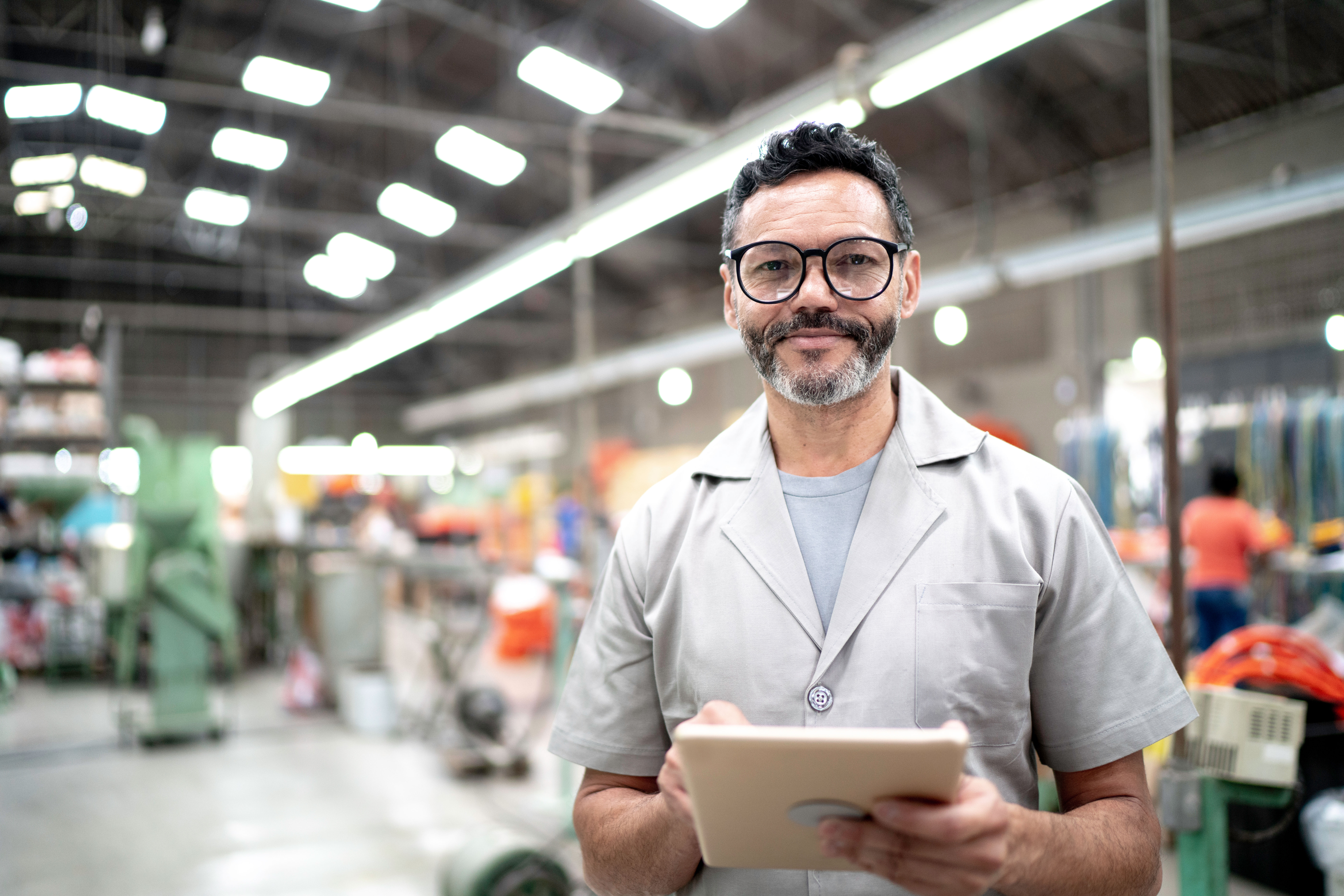 Male production supervisor in production hall