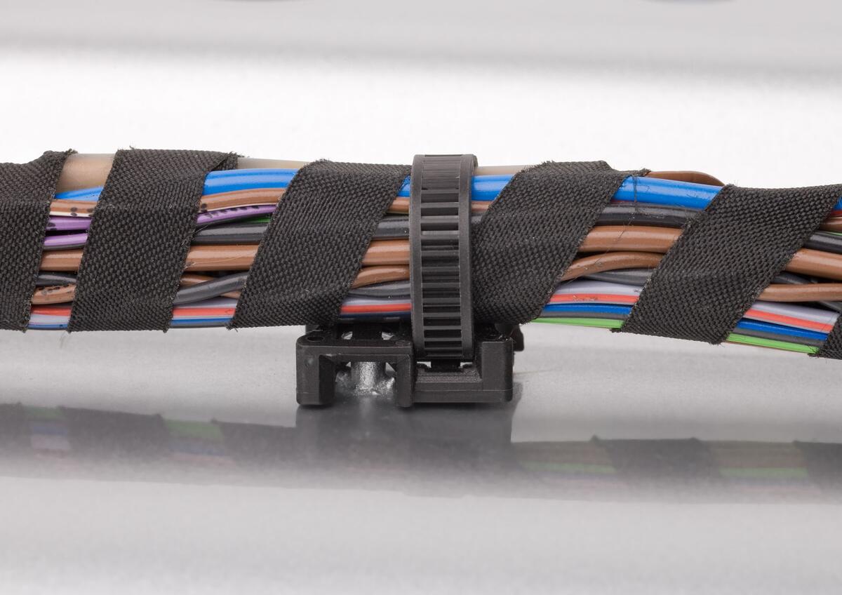 Welding studs with cable tie attachment